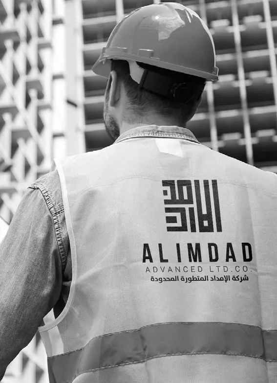 An Al Imdad worker on site in safety gear.